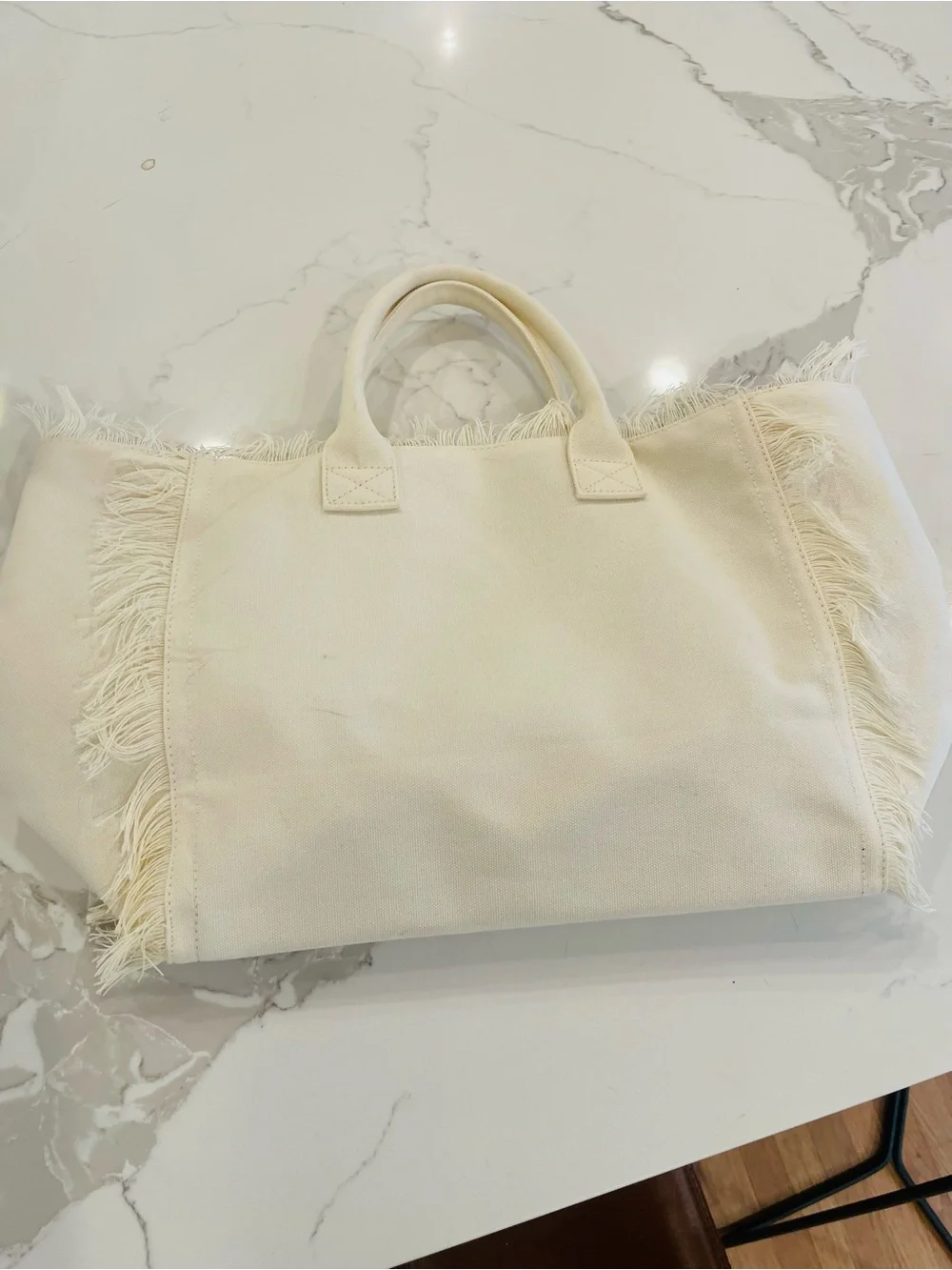 Dolce Vita Cream Canvas Fringe Tote with Light Blue Logo
